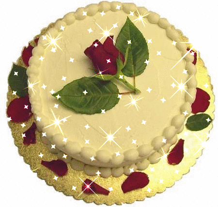 TORTY - urodzinowy tort i platki rozy.gif